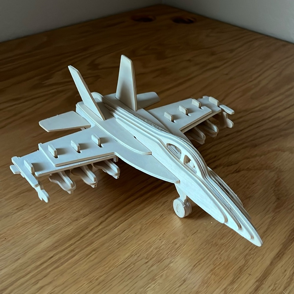 Wooden Airplane. Puzzle, model or paint it
